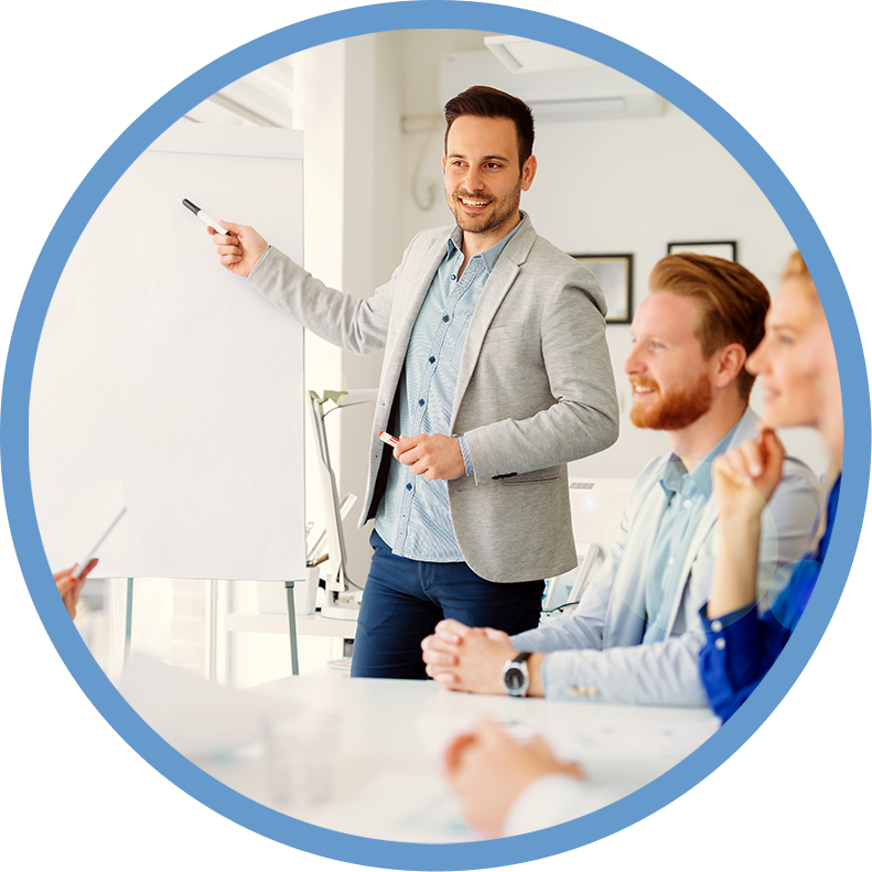 A man is giving a presentation to his colleagues.